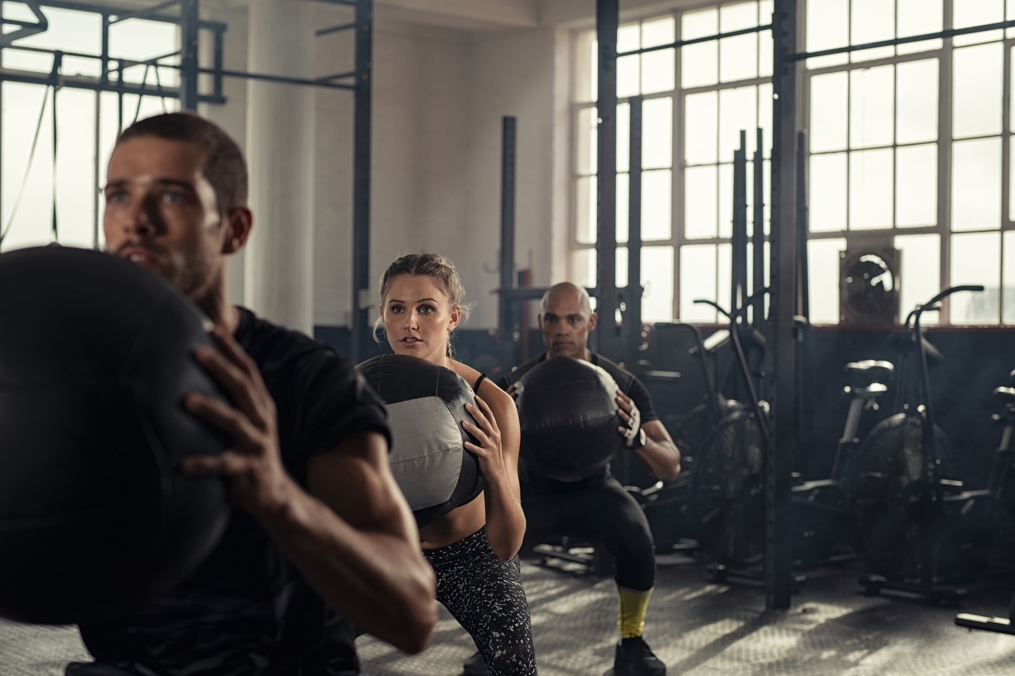 Fitness Class Using Heavy Weight Balls